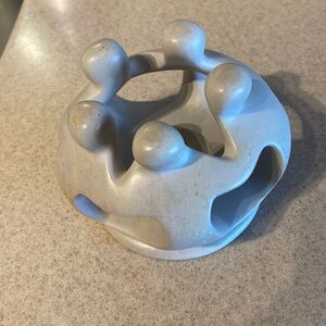 Vintage Families circle of Friends tea light heavyweight left. Natural soapstone